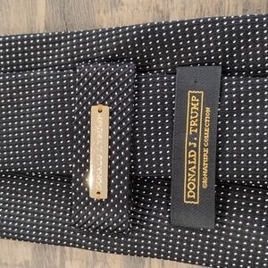 Donald J. Trump collection tie. Black with small white pin dots
